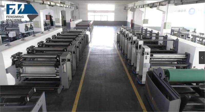 Hệ thống hướng dẫn web và tải / thả tự động cho máy in loại đơn vị