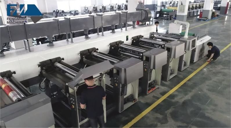 Hệ thống hướng dẫn web và tải / thả tự động cho máy in loại đơn vị